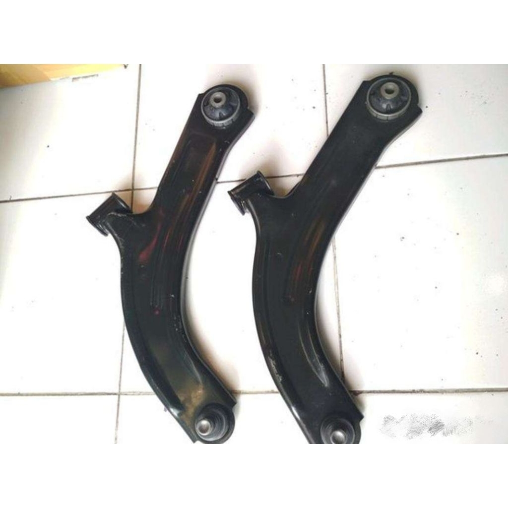 lower arm Livina original original