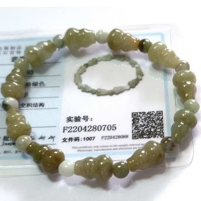 0705  Bead bracelet- gelang  giok jadeite ukiran Holo bersertifikat. Gelang giok ukiran Holo/ Hulu f