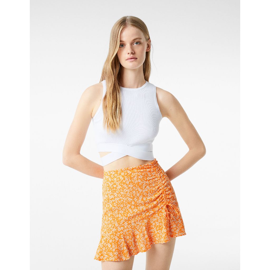 BERSHKA ORANGE FLORAL MINI SKIRT