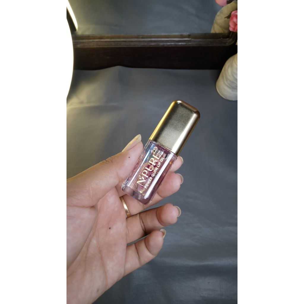 Preloved lip glow oil npure Lip glow oil npure power glow lip oil lip gloss lip base lip topper pele