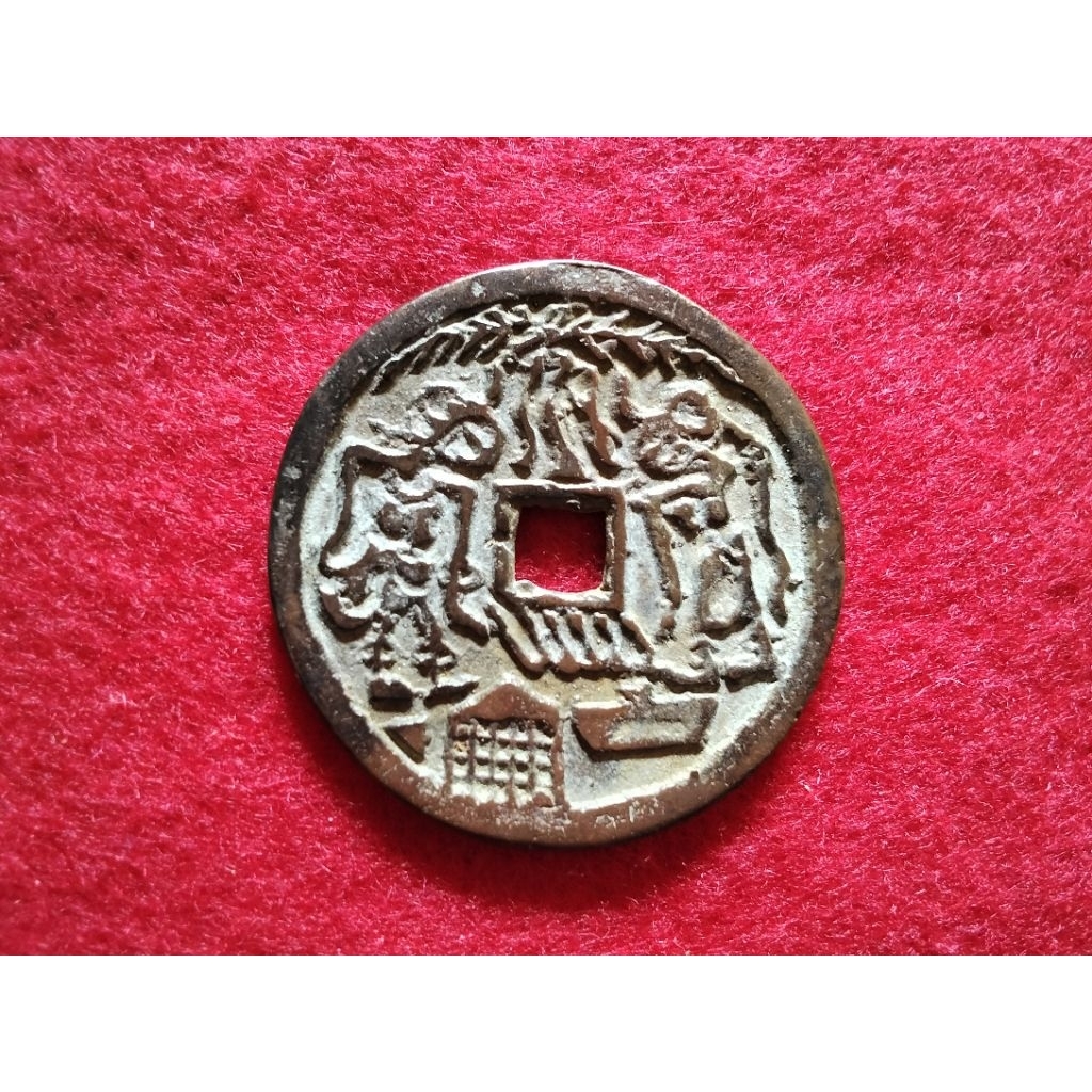 Pis bolong motif wayang .