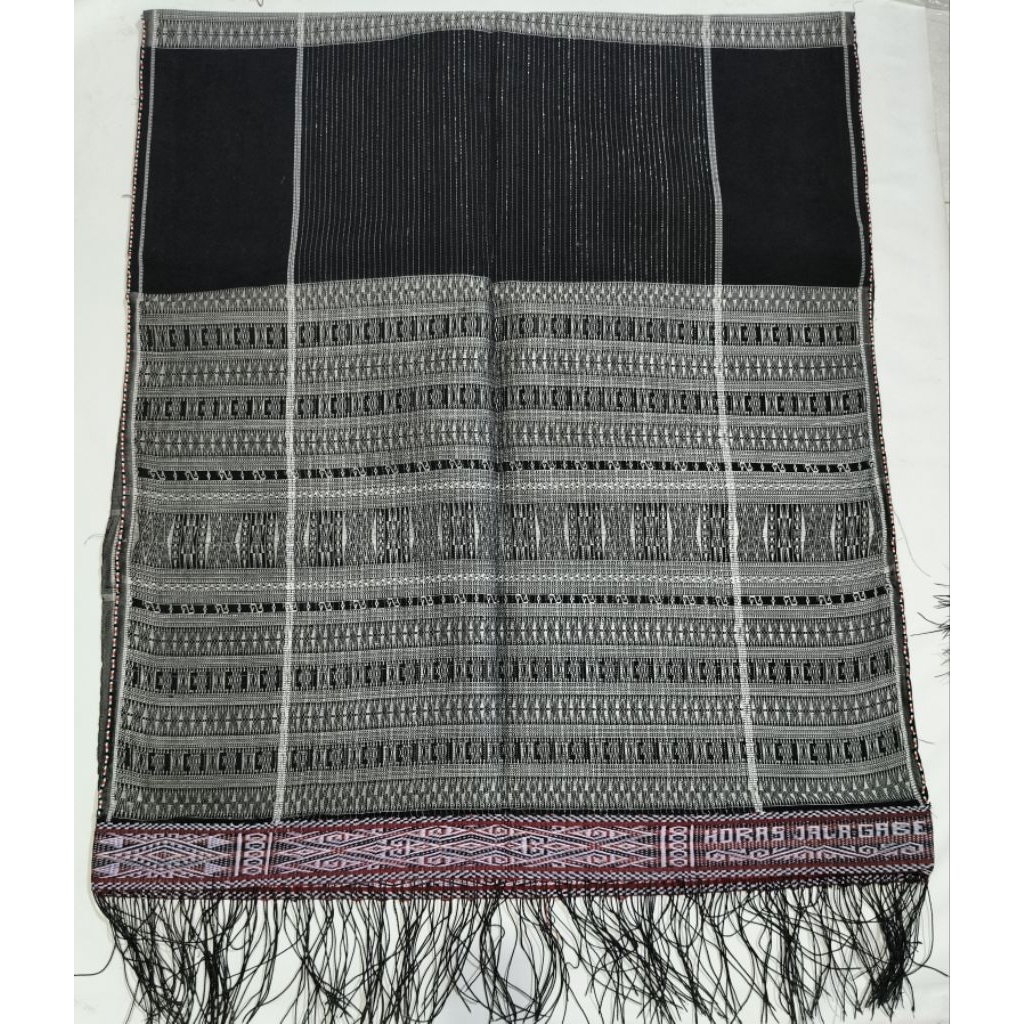 Ulos ragi hotang pakaian adat pria Batak toba