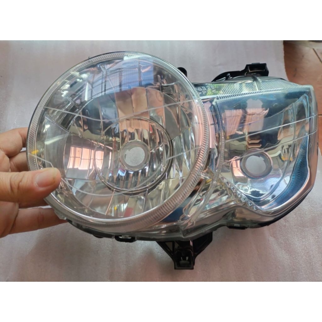 headlamp tiger revo ori.100%  BARU