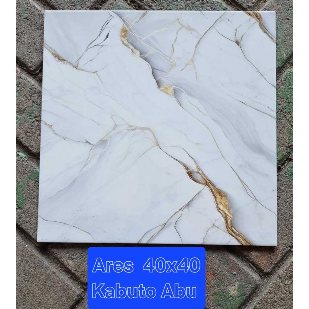 KERAMIK LANTAI RUMAH MOTIF MARBLE MARMER SERAT KUNING KEEMASAN ARES 40X40 KABUTO ABU GLOSSY