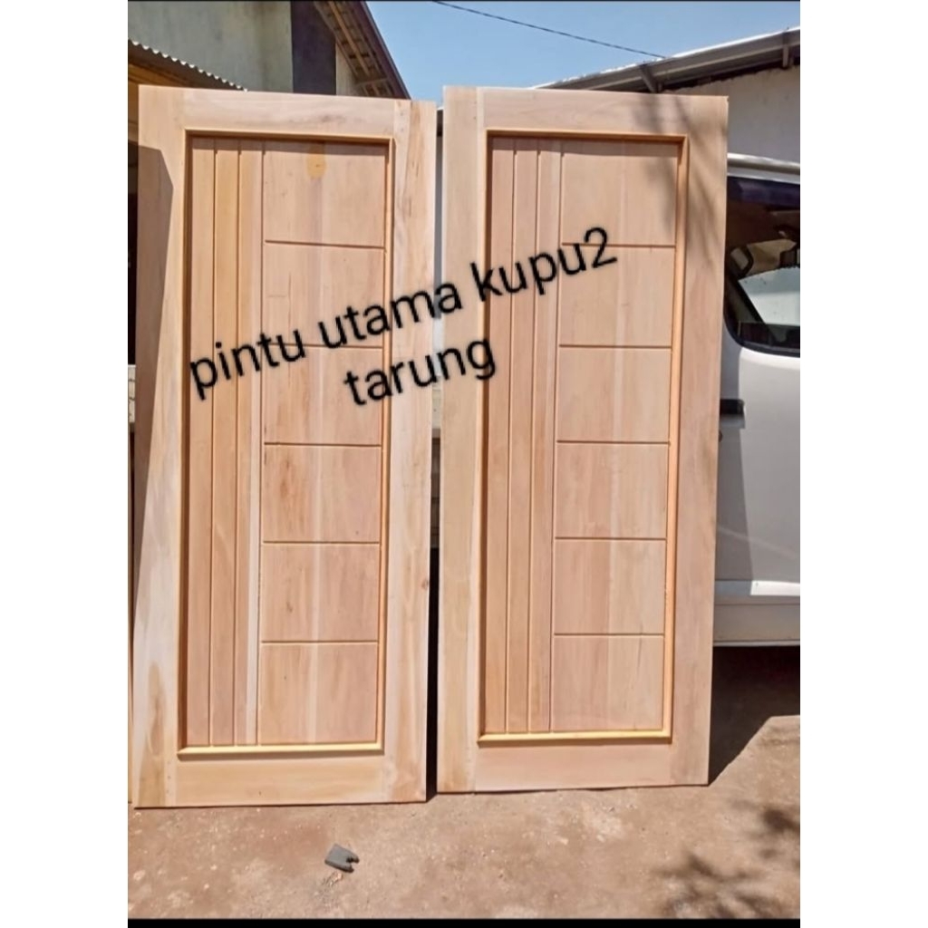 PINTU UTAMA TARUNG KUPU2 DABEL BAHAN KAYU KAMPER DAN MERANTI FULL OVEN BISA  CUSTOM UKURAN DAN MODEL