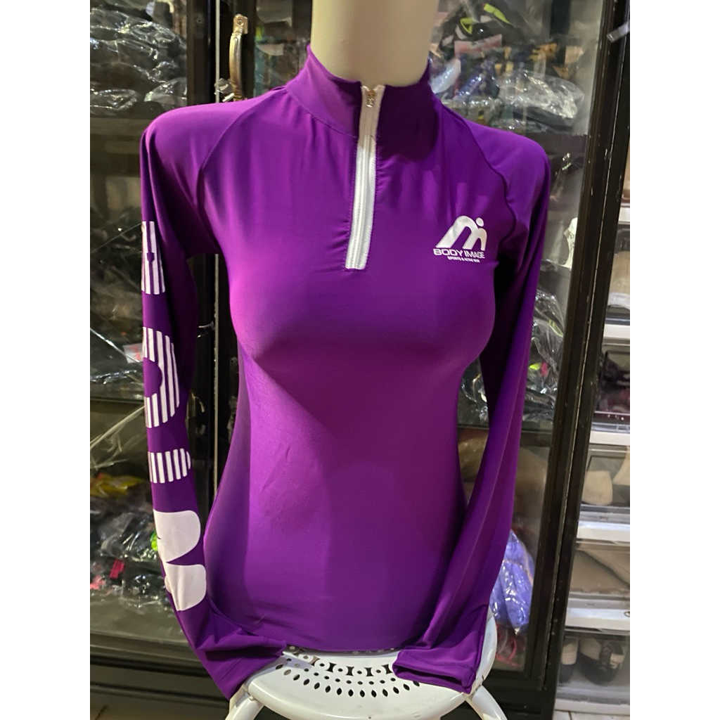 baju senam boim ungu