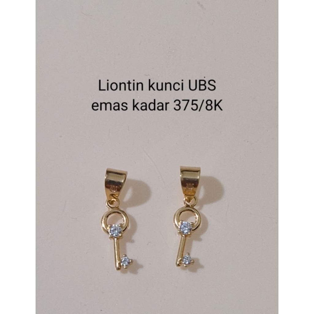 Liontin emas kunci U B S kadar 375/8K (0.44gram)