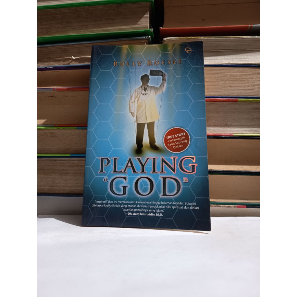 PLAYING GOD - ROLLY ROESLI