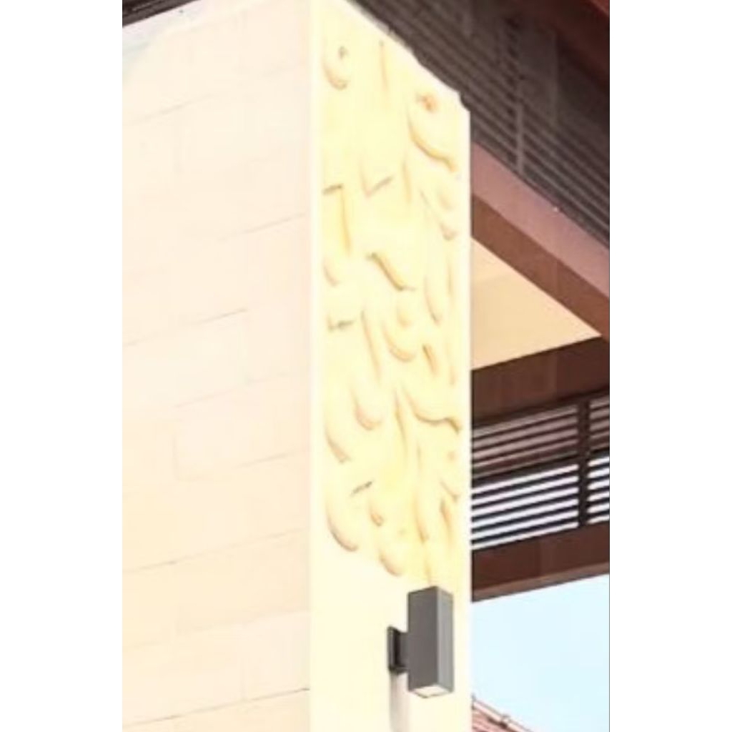 relief batu paras jogja untuk pilar