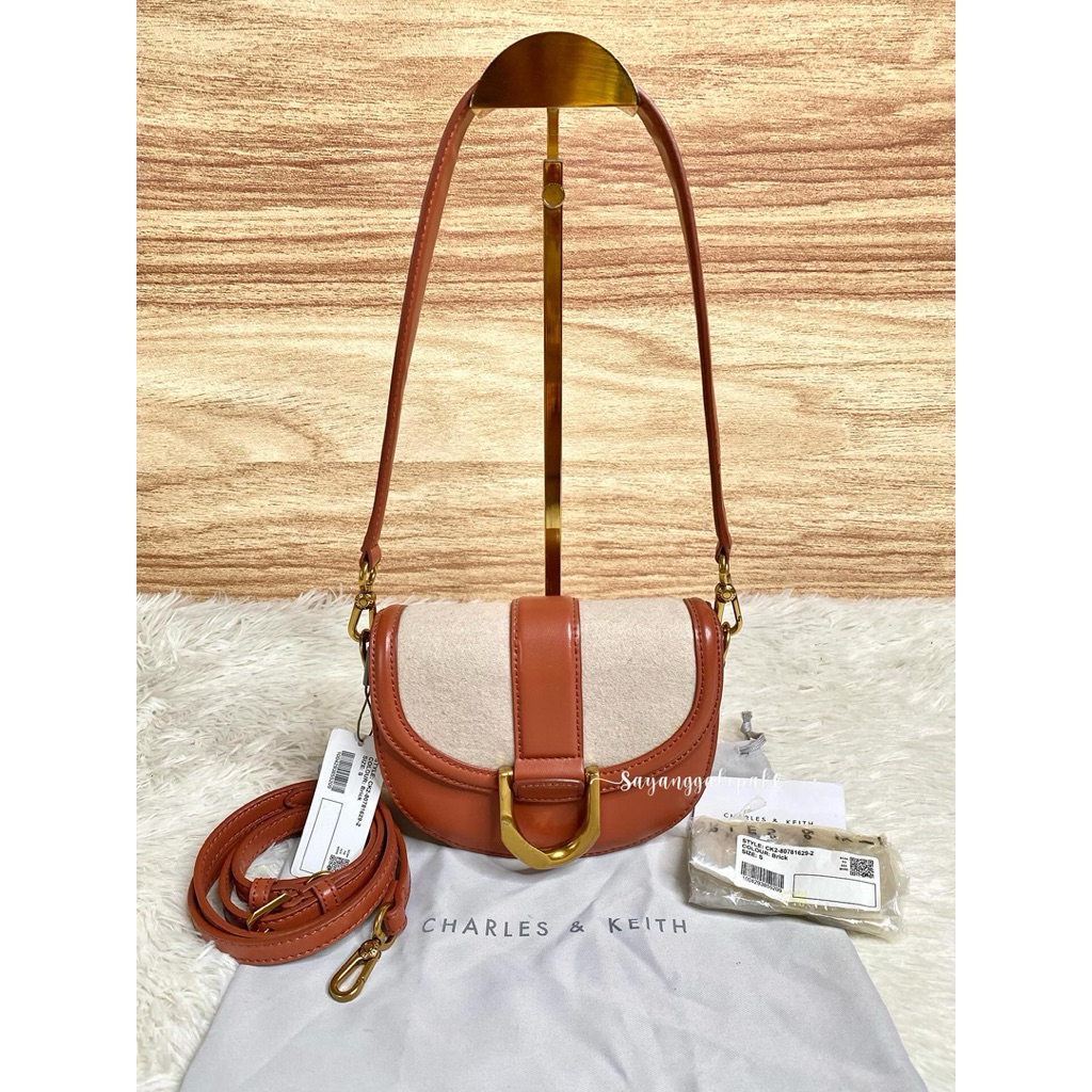 Preloved Charles Keith CK Mini Gabine Saddle Bag Small Tas