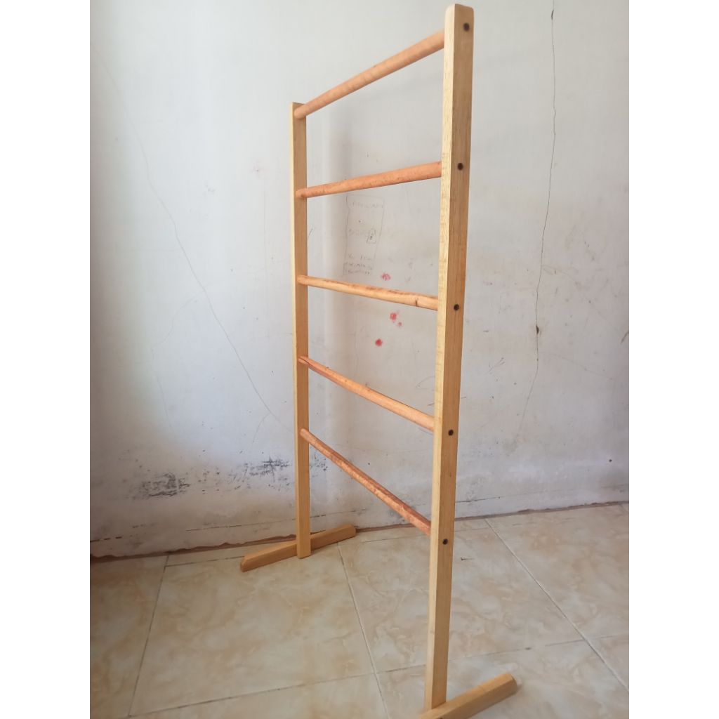 Rak jajanan warung] rak gantungan sejadah mukena