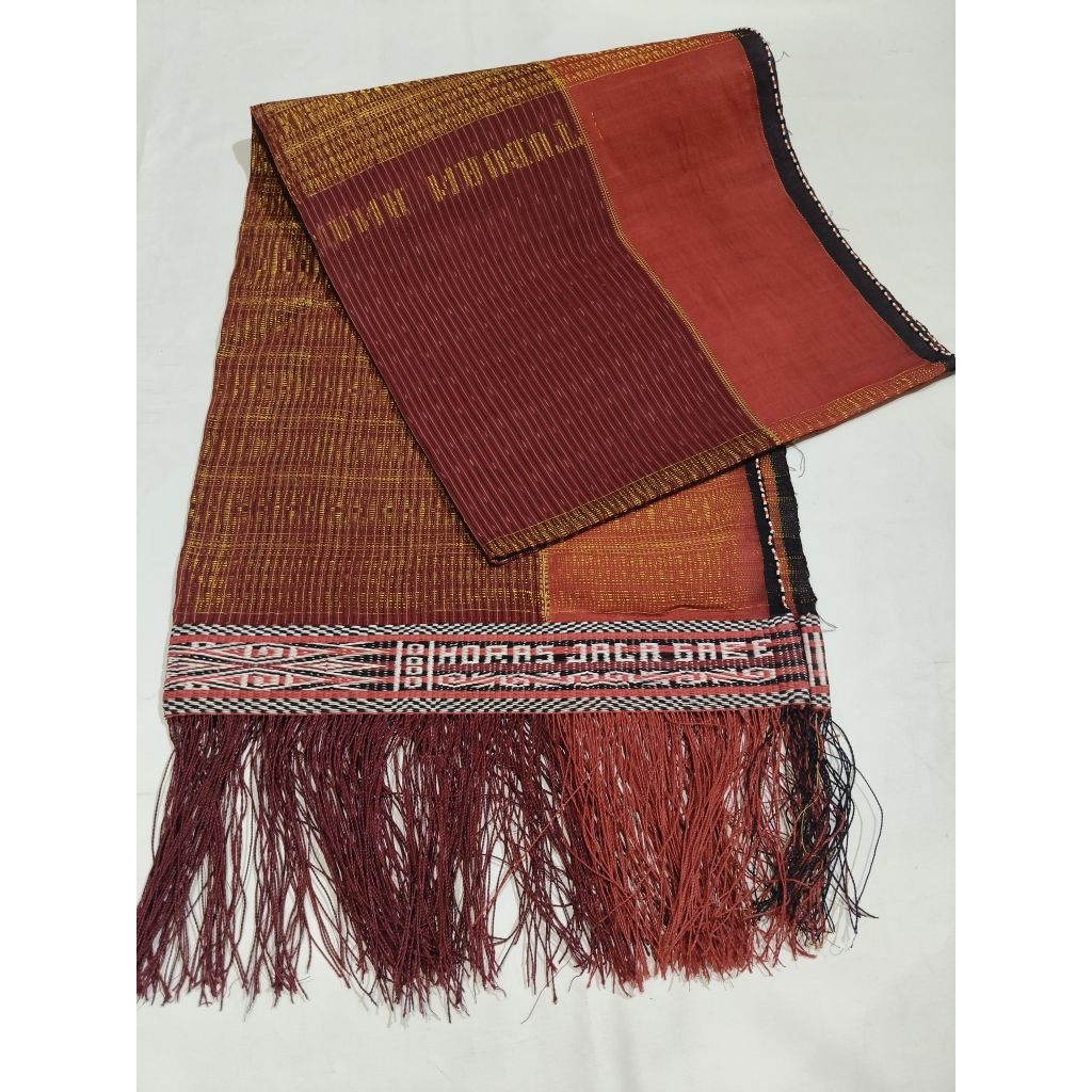 Ulos ragi hotang tenun pintu batu pakaian adat pria  Batak toba