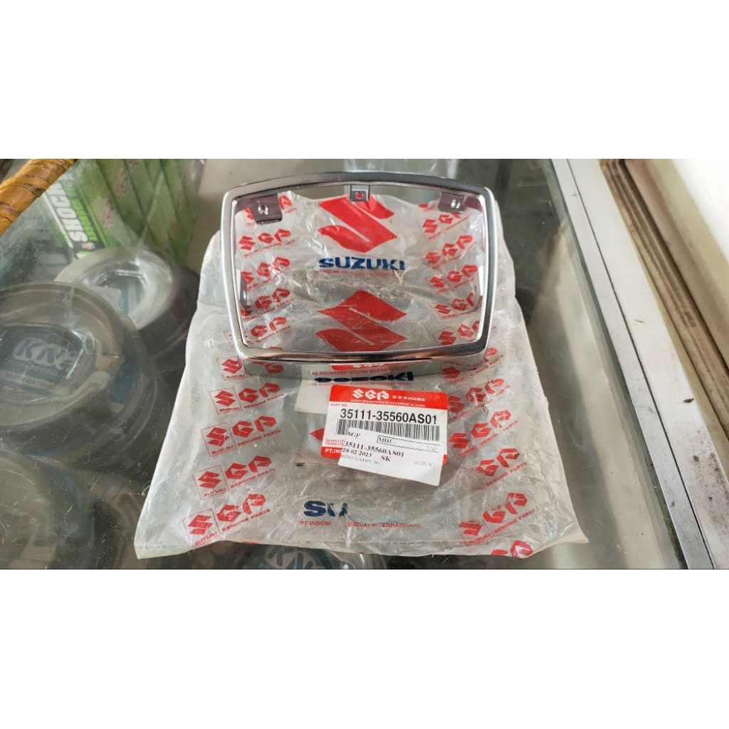 RING LAMPU DEPAN RC100 BRAVO ORIGINAL SGP