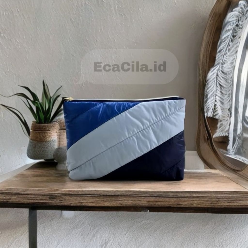 Pouch Estee Lauder puffy Strip