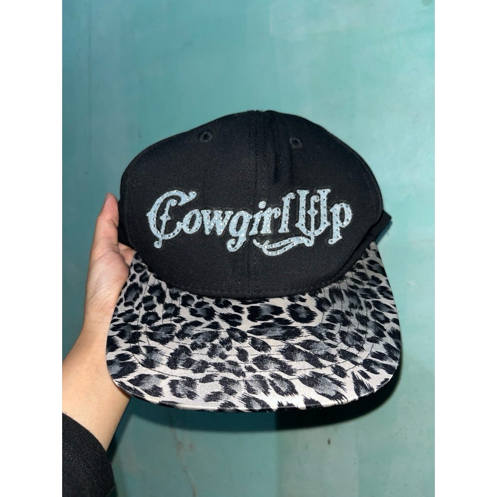 topi leopard