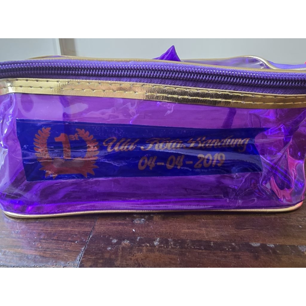 pouch ungu transparan