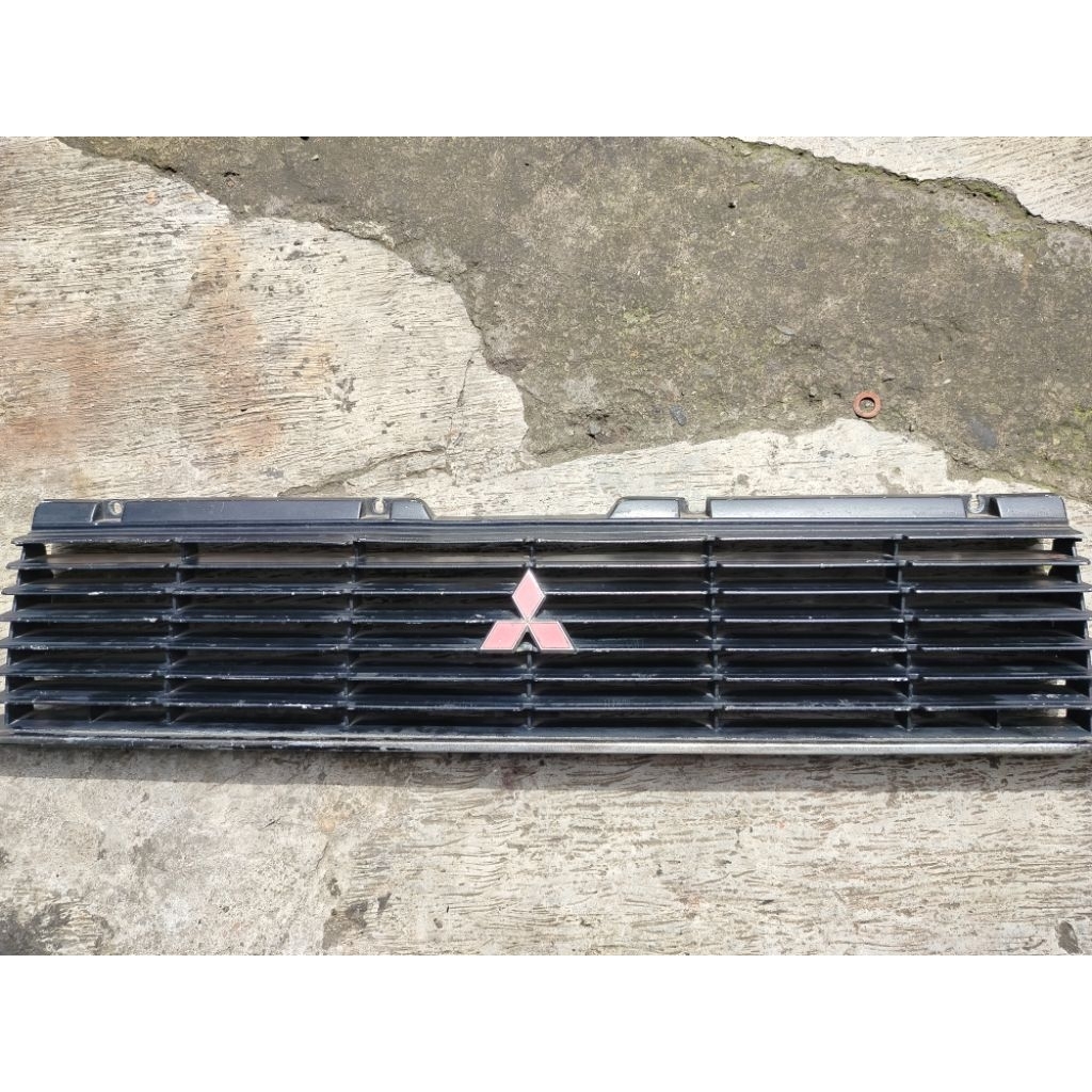 grill Mitsubishi Lancer SL