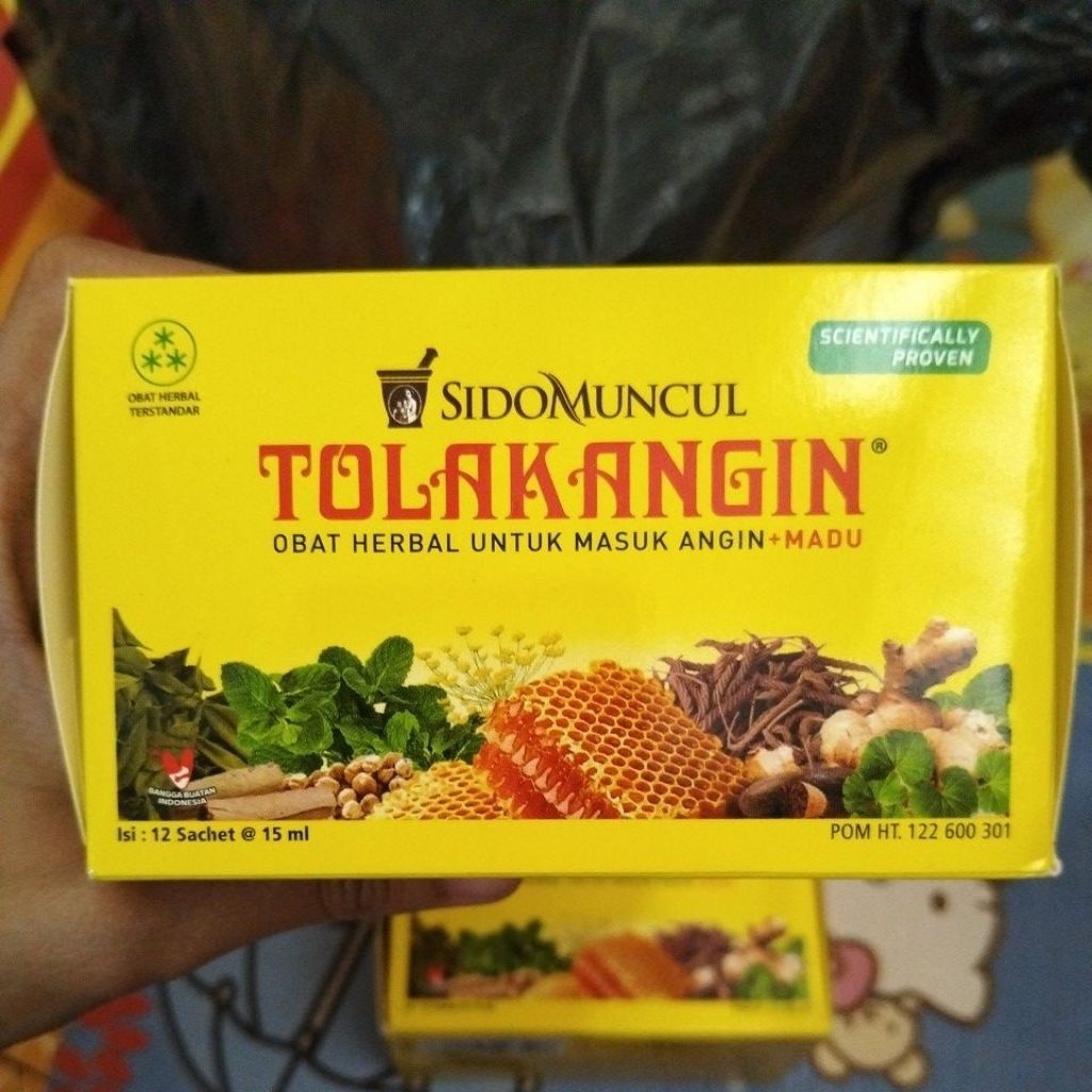 tolak angin cair isi 12