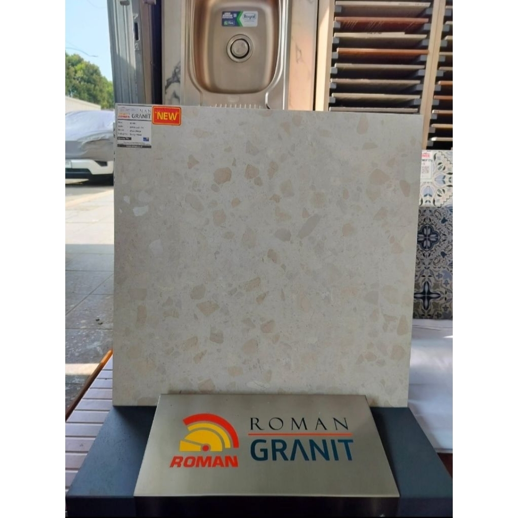 GRANIT MERK ROMAN TIPE dTRANI BEIGE UKURAN 60X60 PERMUKAAN TEKSTUR MATT UNTUK LANTAI ATAU DINDING