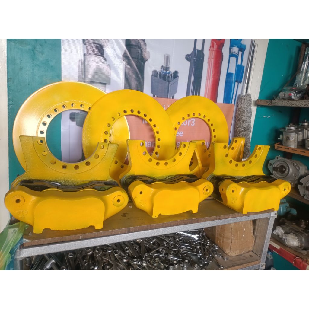 Rem cakram loader Caterpillar original copotan dari unit lengkap dengan piringan bekas siap pakai
