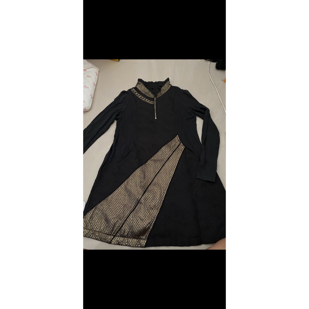 black dress motif gold