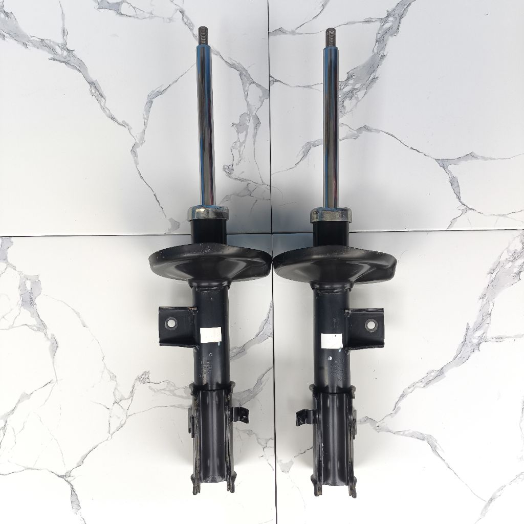 shock suzuki grand vitara depan