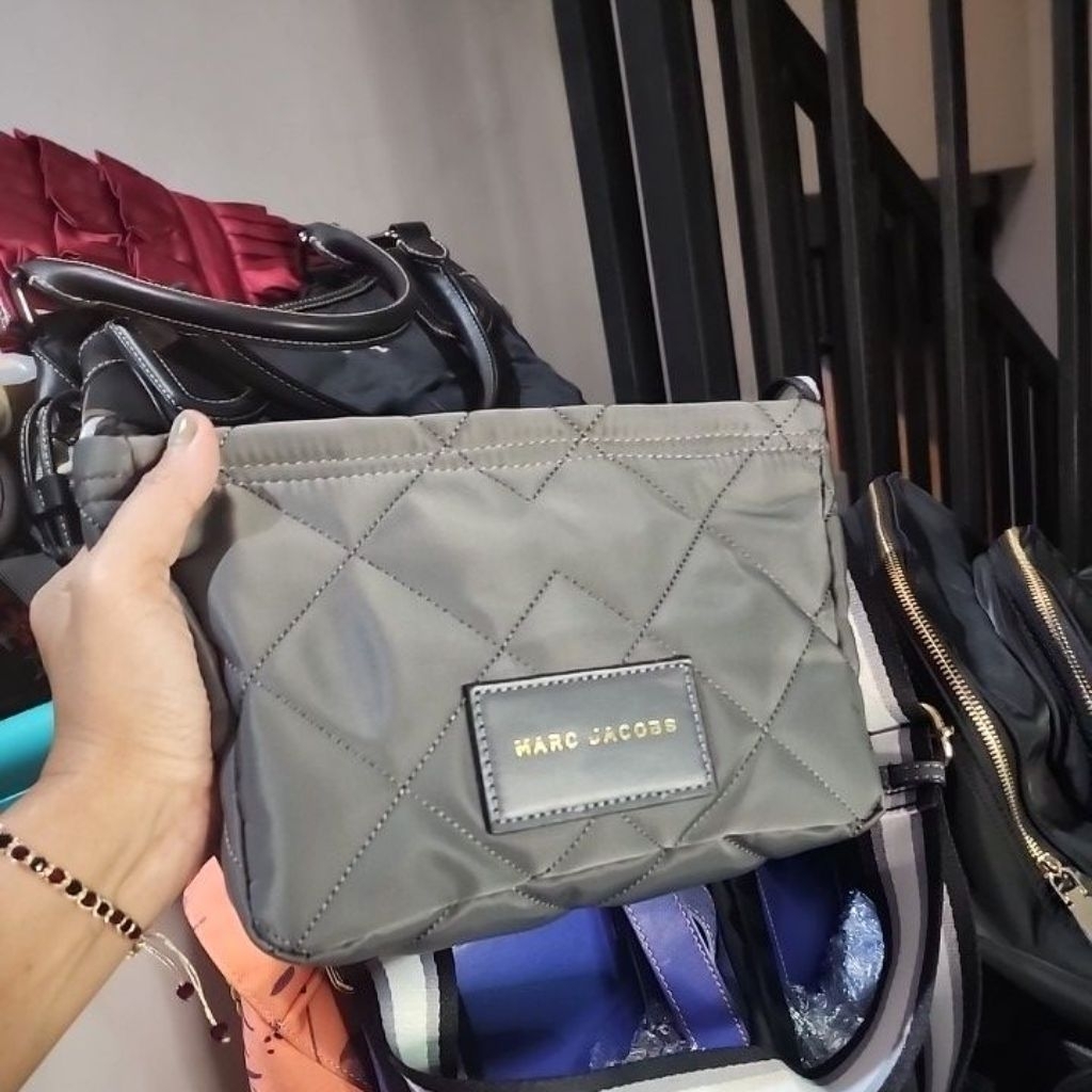 preloved MJ sling bag