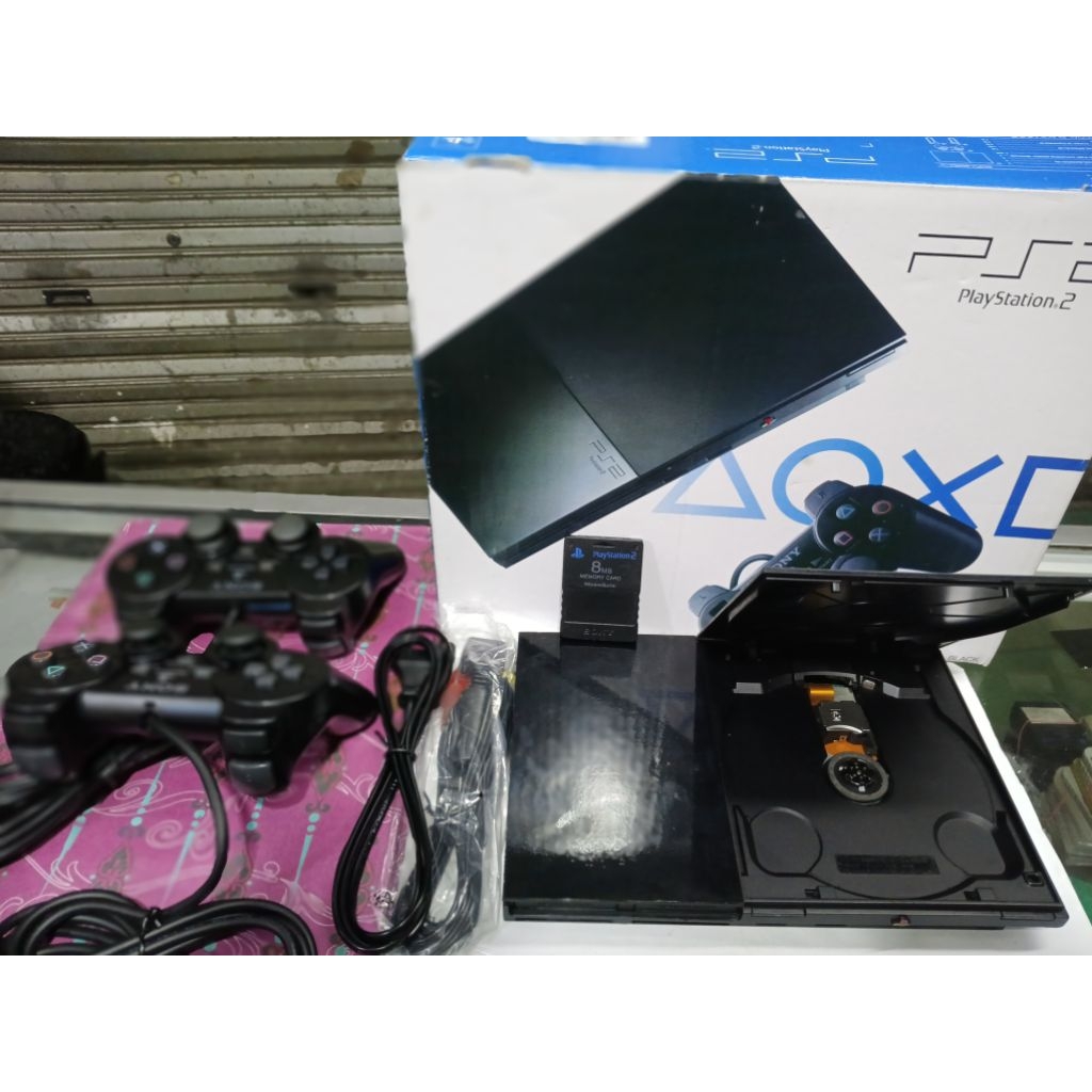 ps2 slim Sony seri9  bisa kebaca kaset paket komplit.seperti di foto