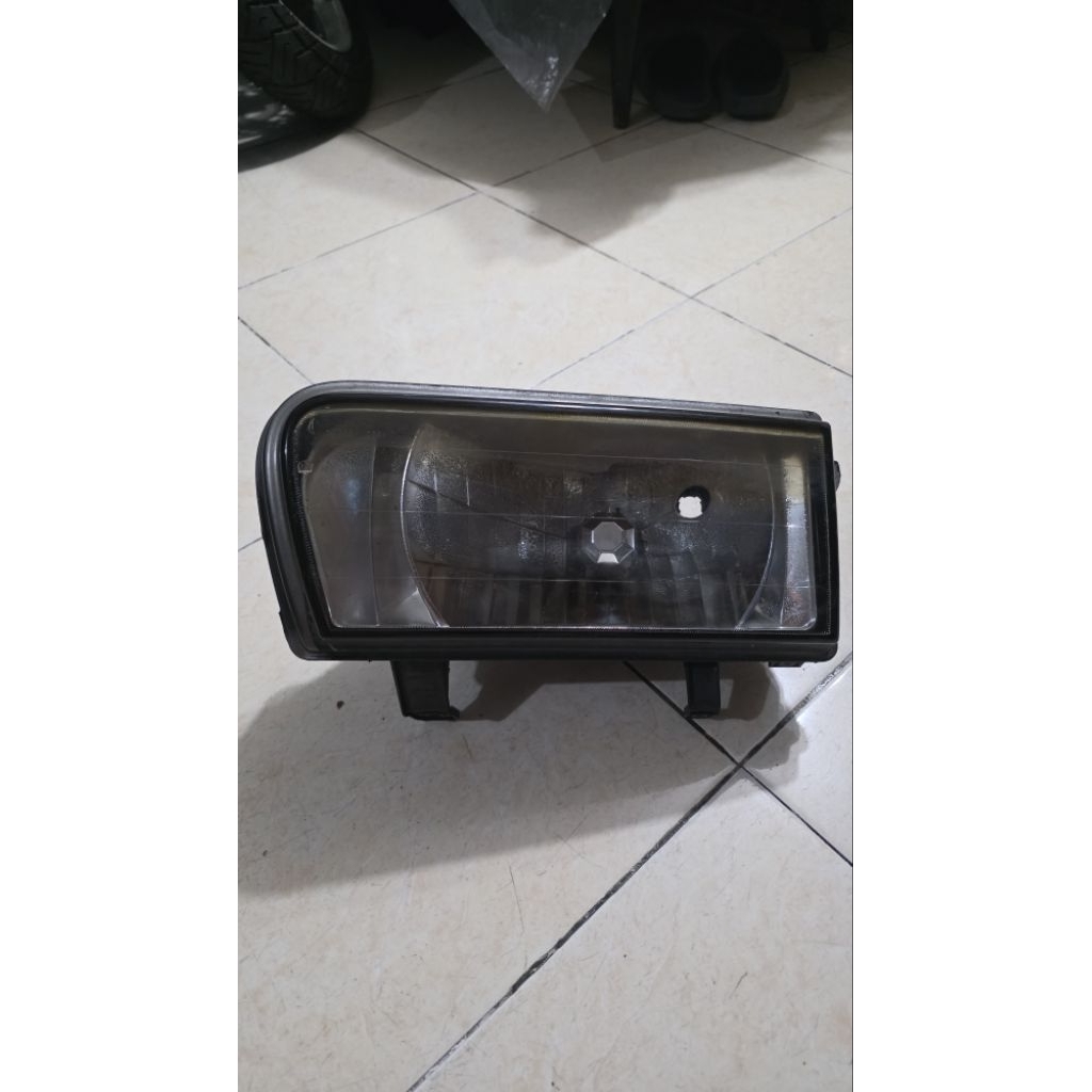 LAMPU DEPAN ISUZU PANTHER TOURING KAPSUL BAGIAN KIRI DEPAN SETIR ORIGINAL BEKAS