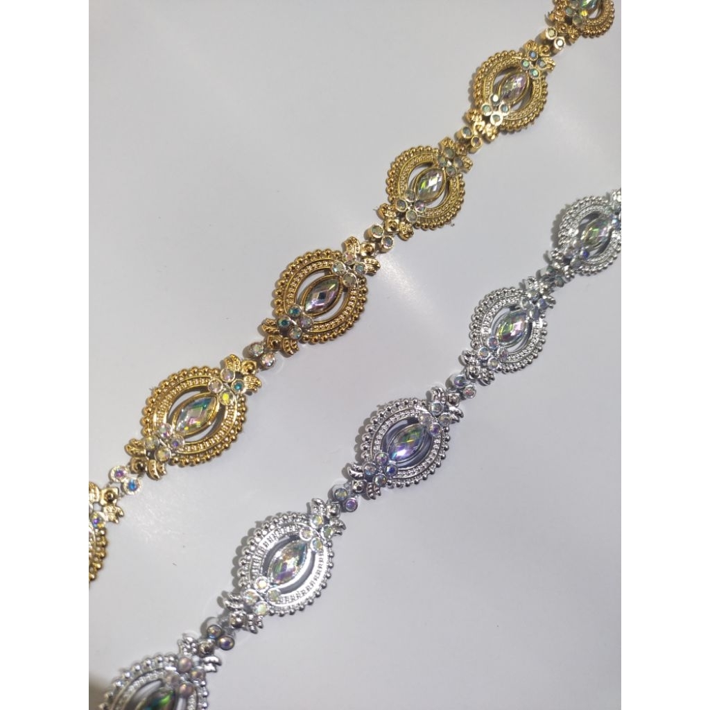 Renda meteran emas &perak