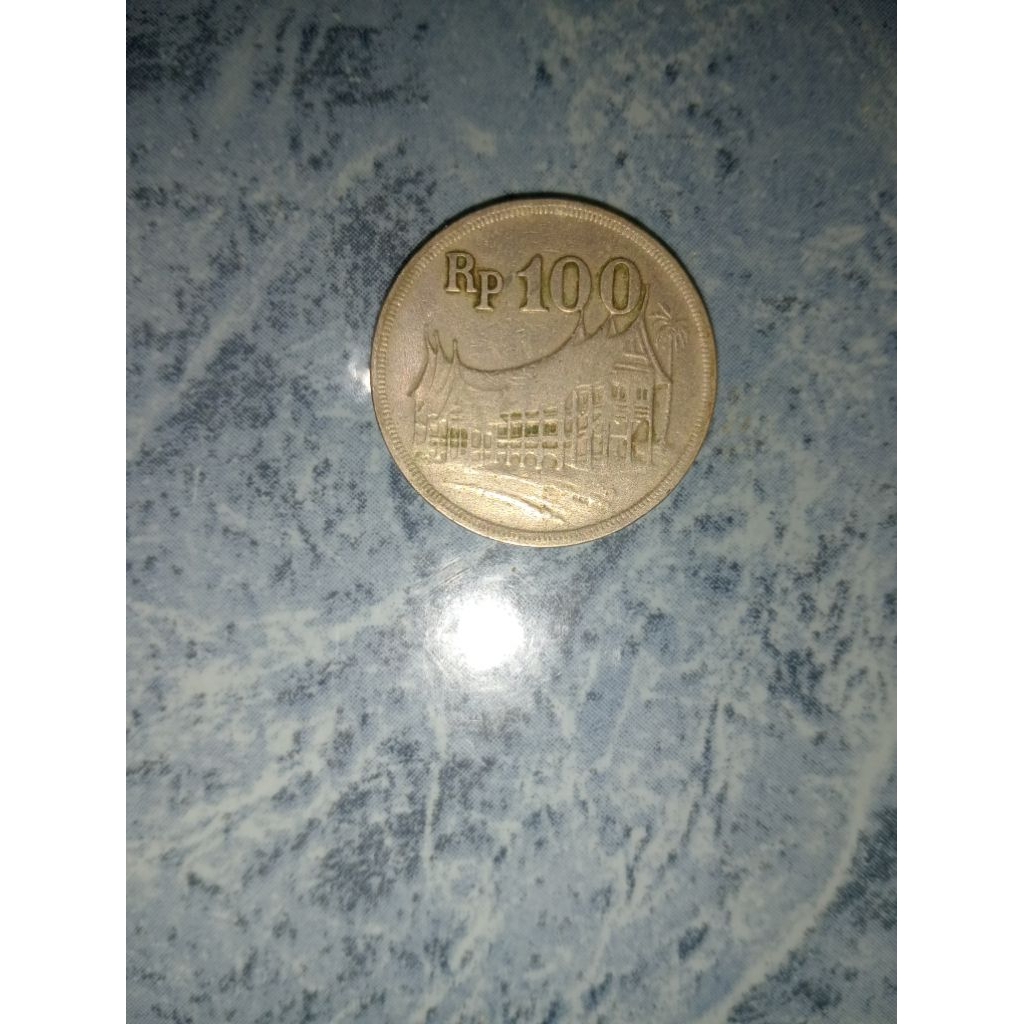UANG KOIN 100 RUPIAH KUNO ( original )