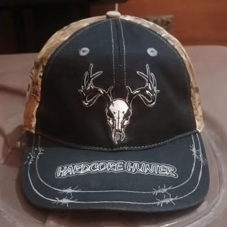 topi Hardcore Hunter, kamuflase hunting cap, Aop real tree and bordir, tag pembuatan.