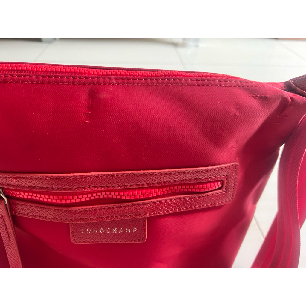 Tas Long champ