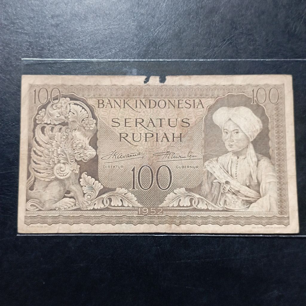 uang kertas 100 rupiah budaya tahun 1952 bekas jelek asli