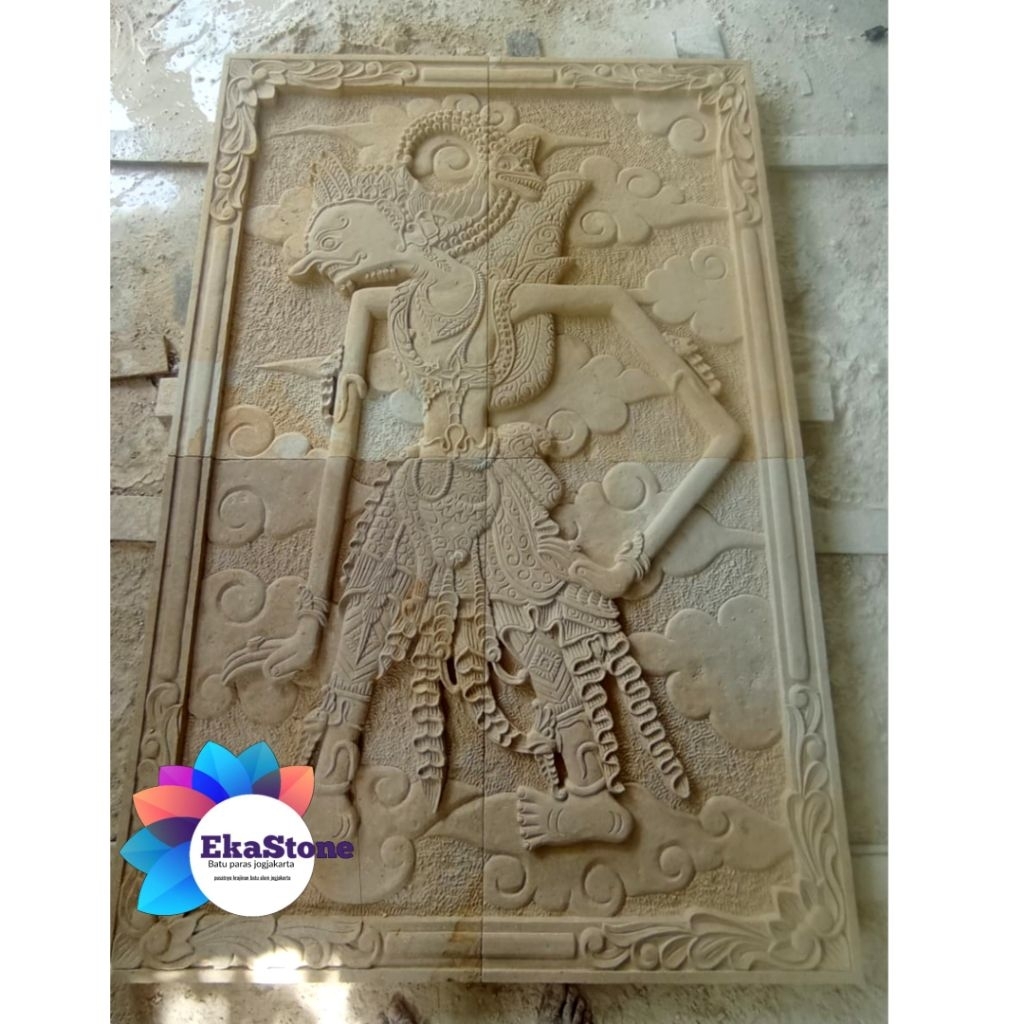 batu ukir relief dinding motif wayang Gatotkaca