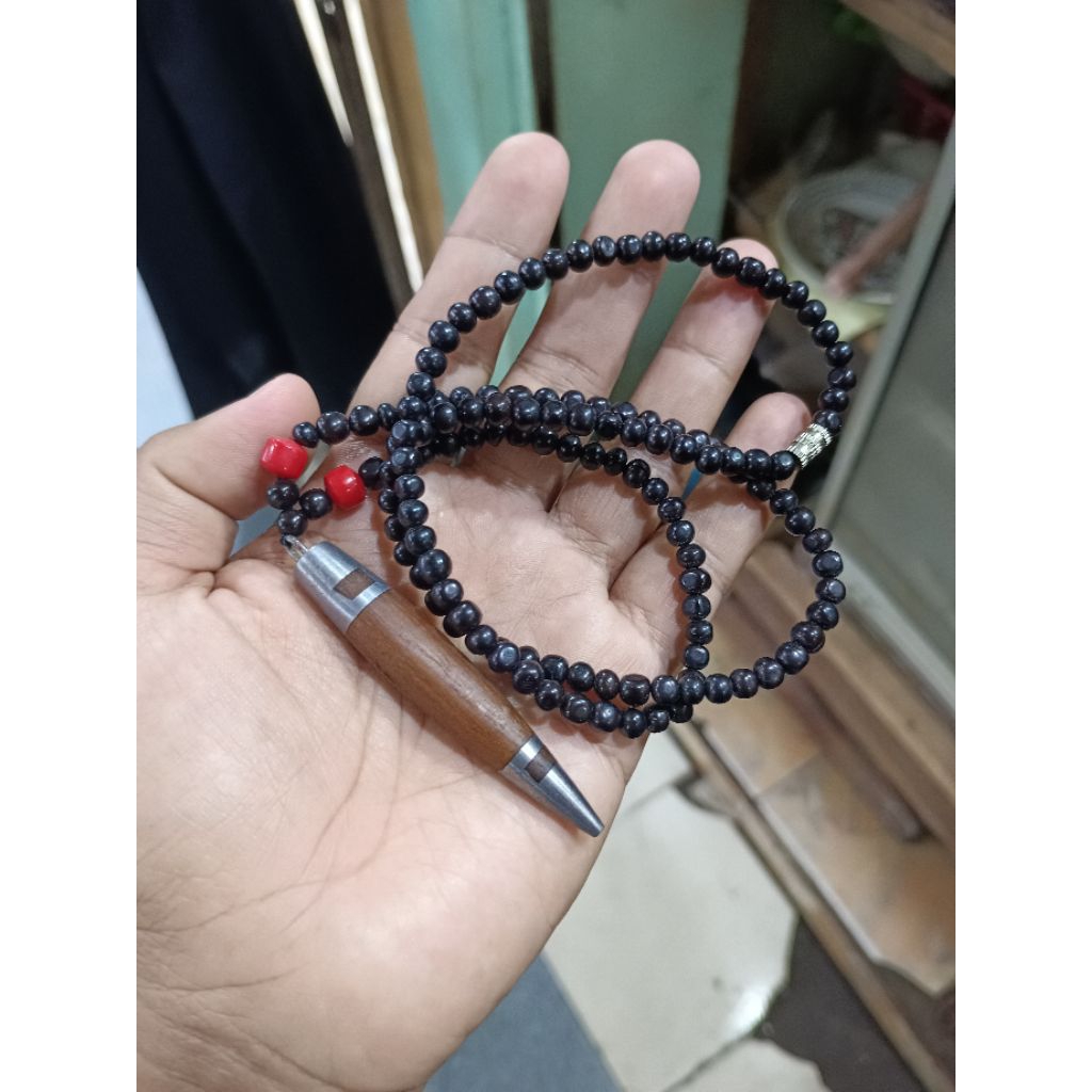 kalung ca kayu ulin karya nini imay