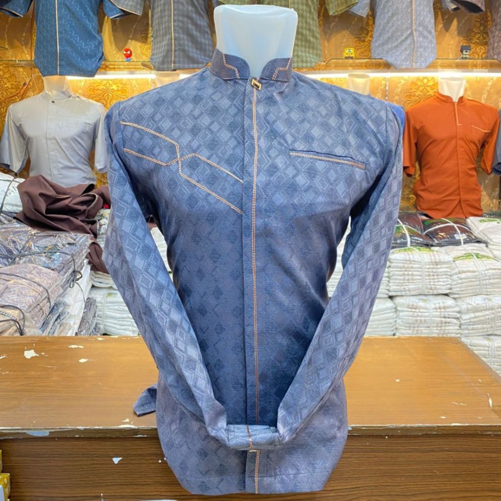 baju koko exclusive lengan panjang warna taro(ungu muda) bahan katun dominim dan sudah dilapisi trik