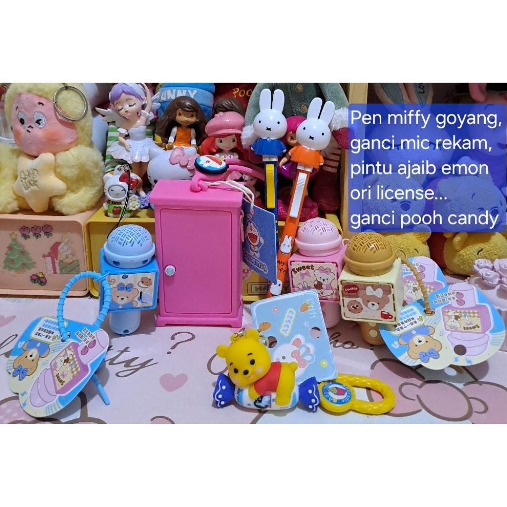 STRAP HP GANTUNGAN KUNCI BAGCHARM DOREMON ORI LICENSE POOH PULPEN MIFFY ORI LICENSE GANCI STAND HP O