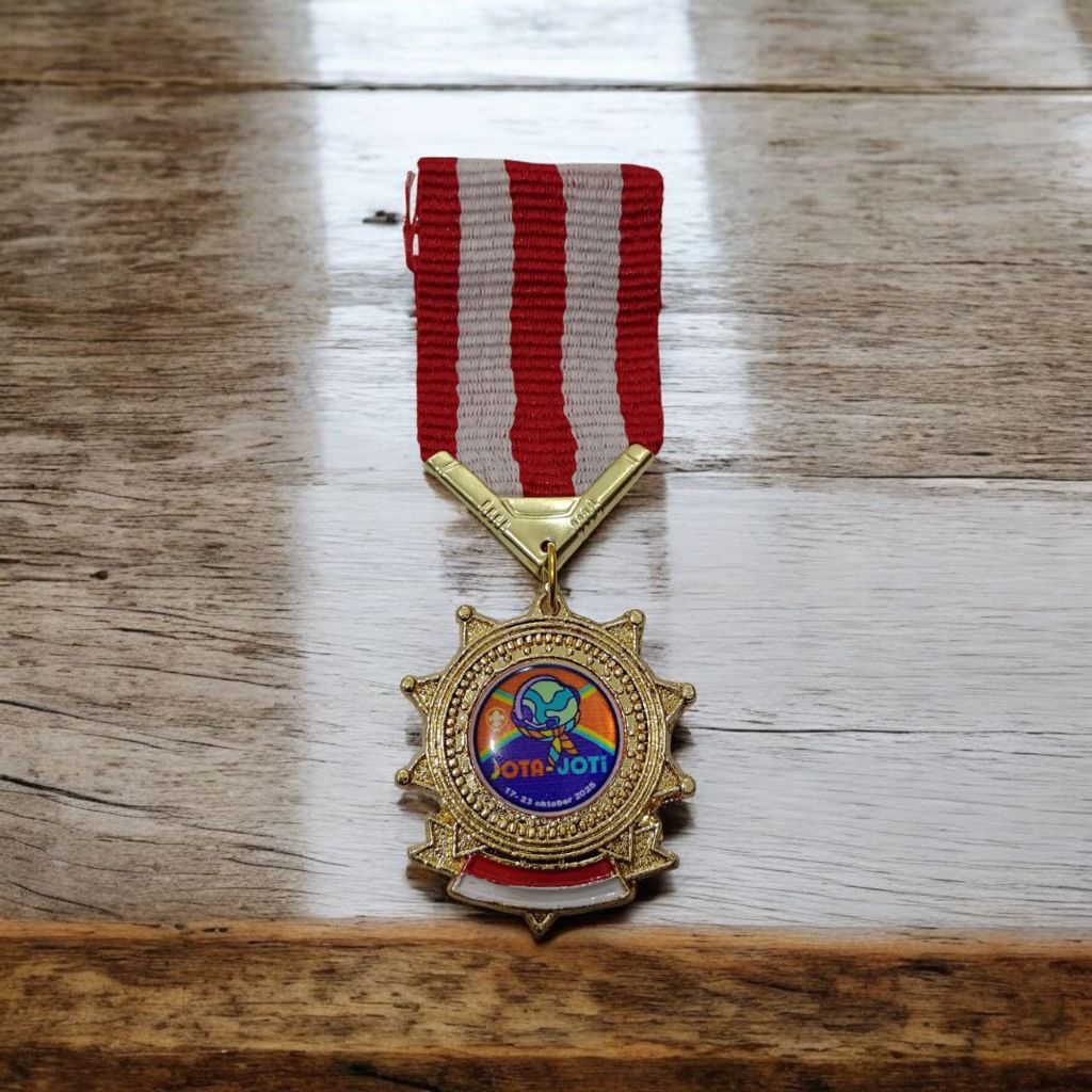 tiska pin logam jota joti