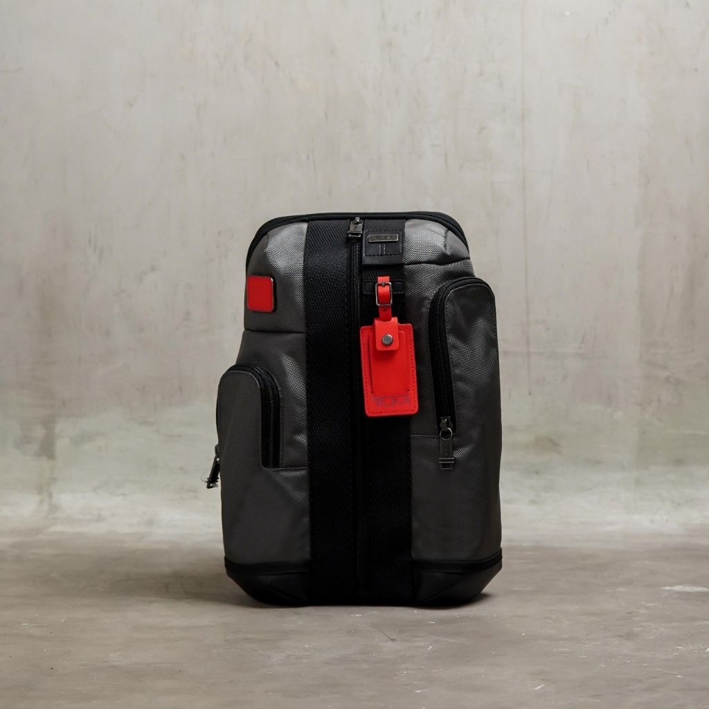 TUMI Higgin Nylon Red Cross Body Bag in Black