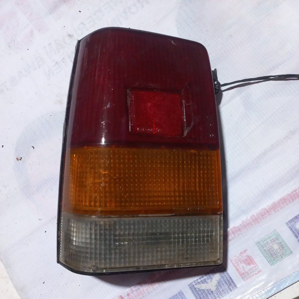 STOP LAMP LAMPU BELAKANG DAIHATSU CHARADE  86 sd 87 ORIGINAL