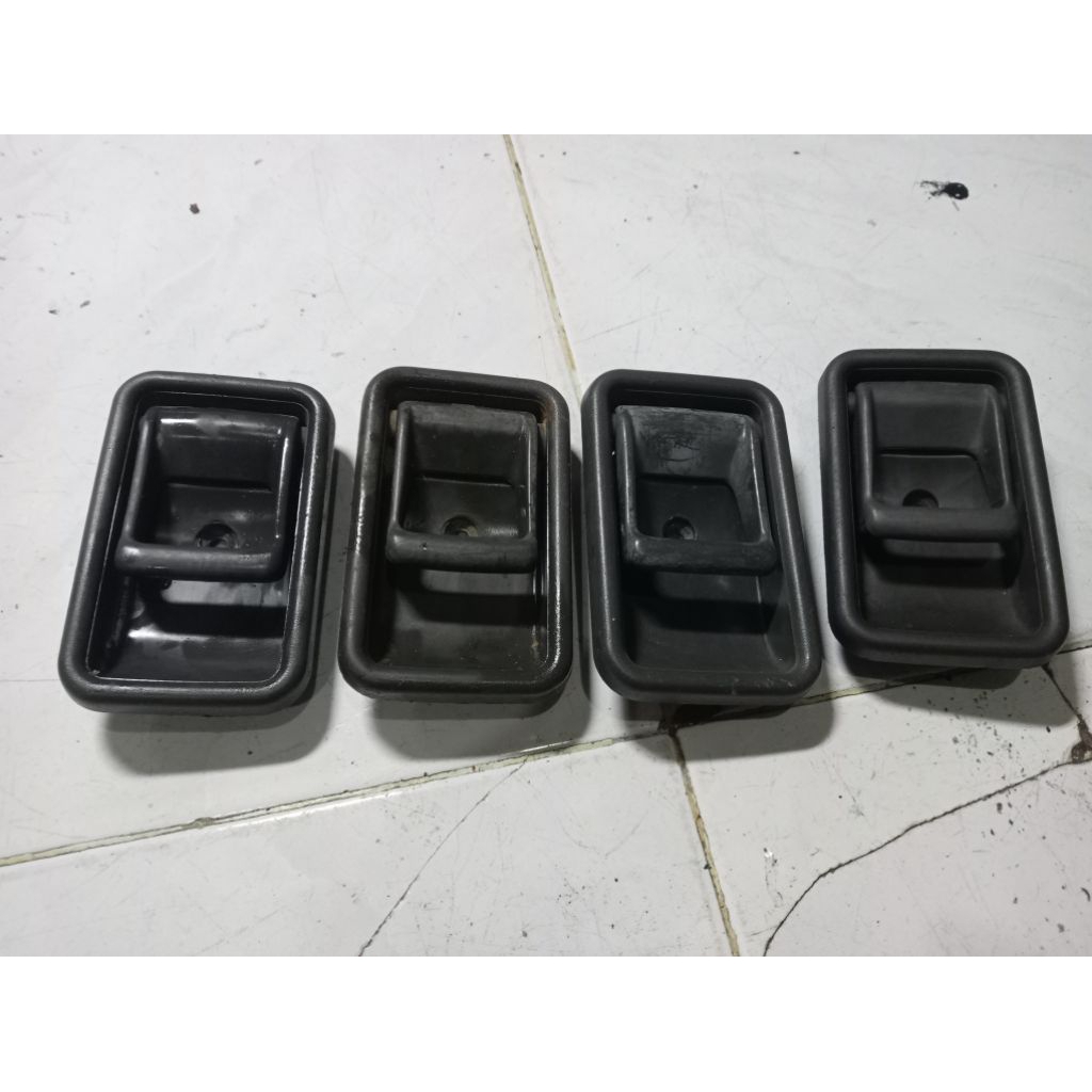 handle pintu dalam mazda 323 elite - ford laser