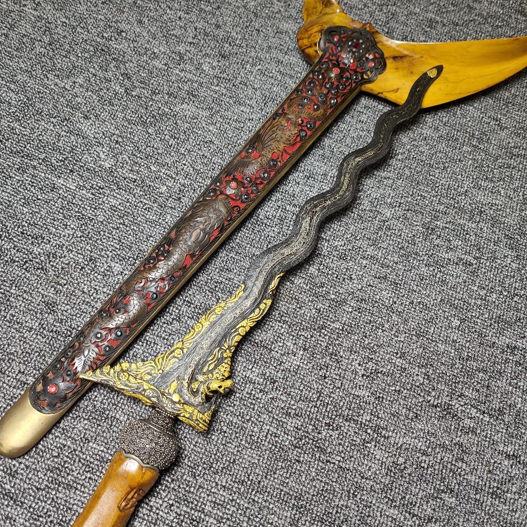 pusaka nogo sosro kinatah emas kamarogan