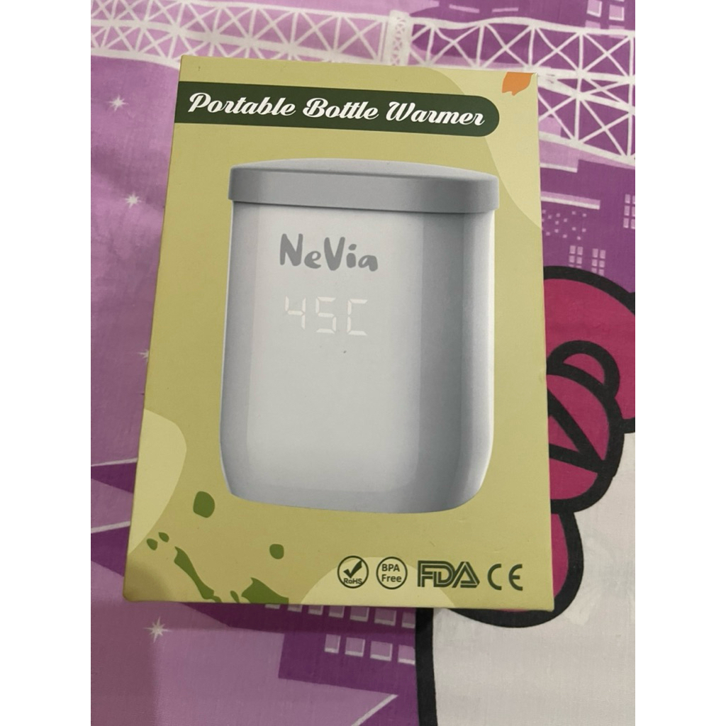 Preloved- Nevia Portable bottle warmer
