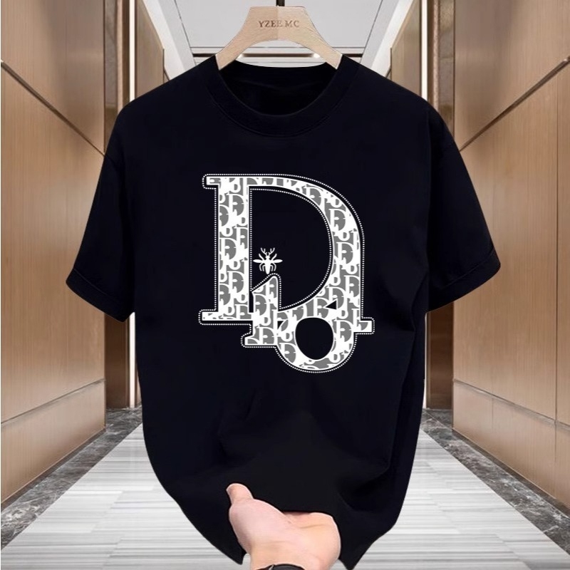 COD Kaos Hitam Pria Desain Logo Dior Kreatif dengan Karakter Monster Imut untuk Gaya Mewah Kreatif
