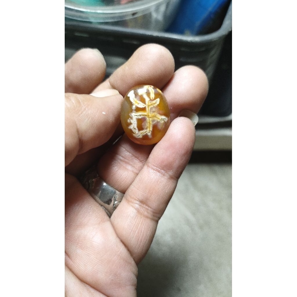 Batu Tulisan Kanzi atau Serat Virus. bentuk liontin atau cincin
