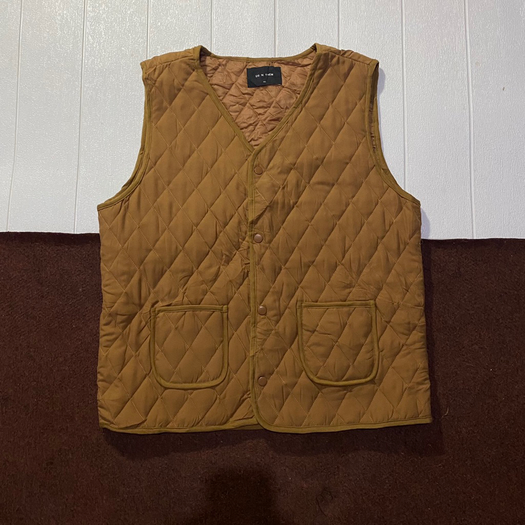 vest puffer us n them size L ( lik new )