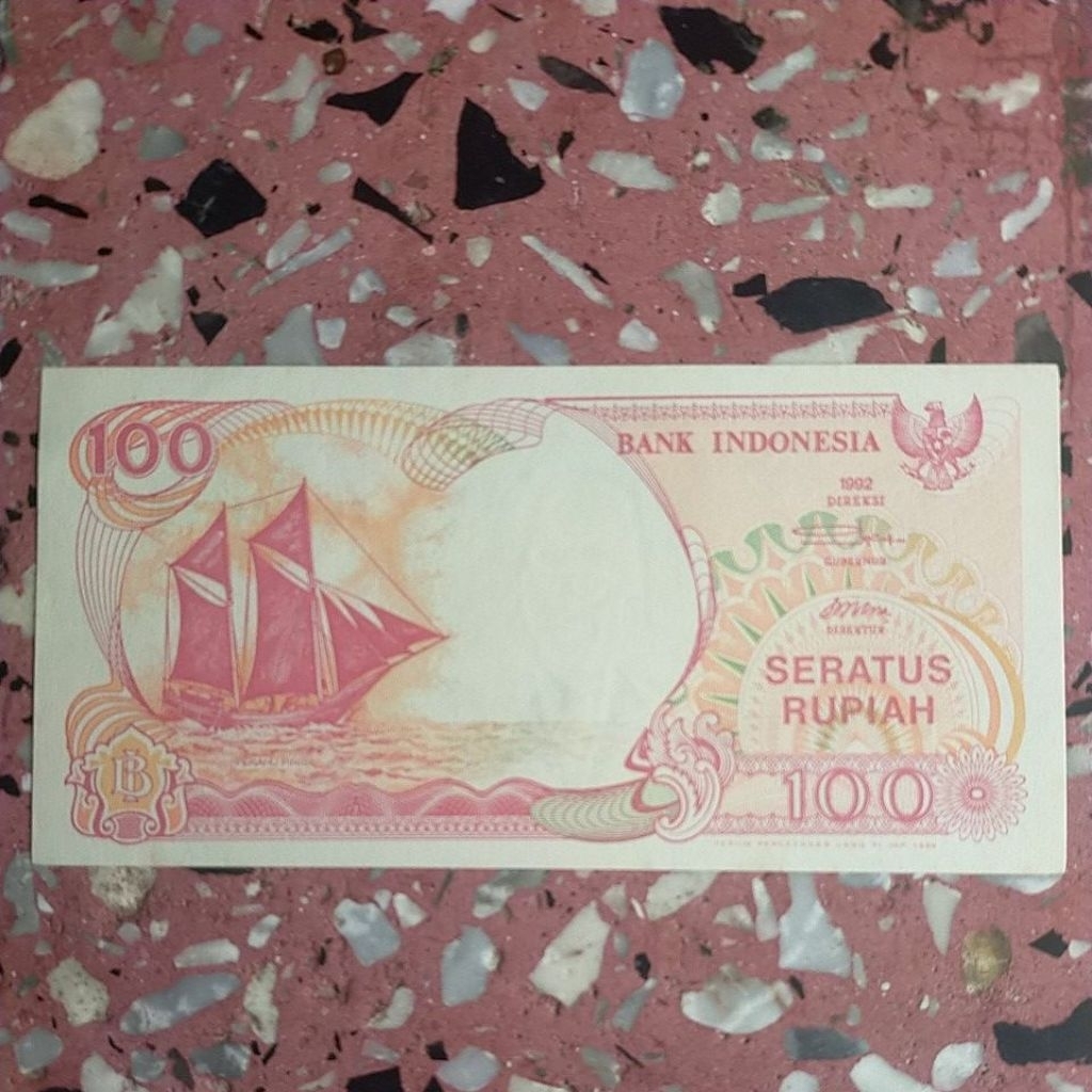 100 rupiah pinisi nomor seri cantik