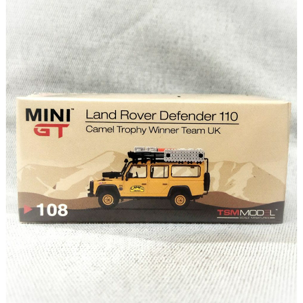 Mini GT Land Rover Defender Camel Thropy Winner UK Team