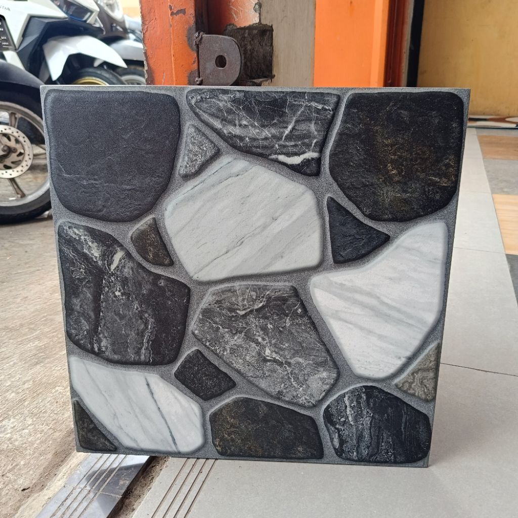 Keramik lantai 50x50 motif batu haystone grey